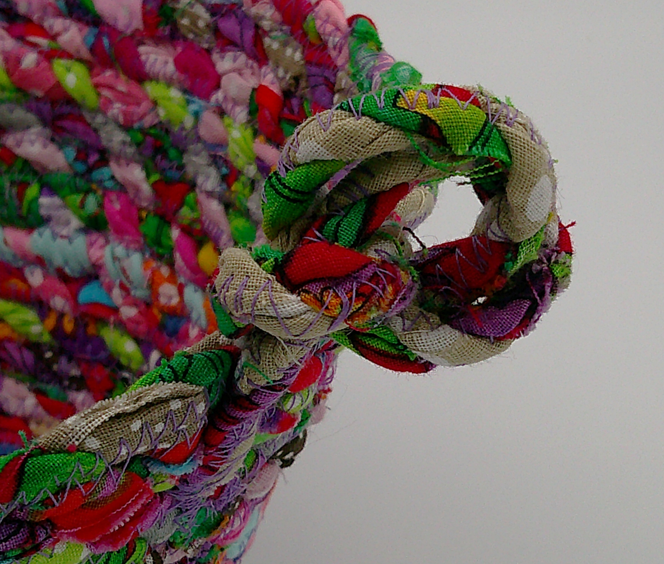 This is a close up of the knot to show the rustic look of raw edges and some runaway threads. This is a close up of the knot to show the rustic look of raw edges and some runaway threads.